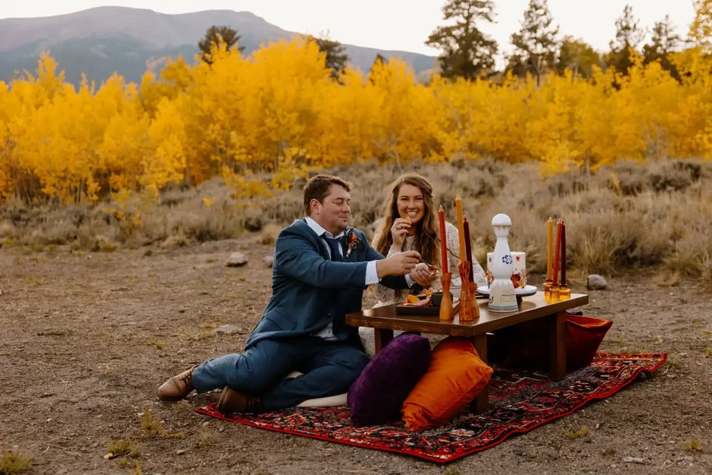 Couple shares a luxury elopement picnic near Breckenridge Colorado