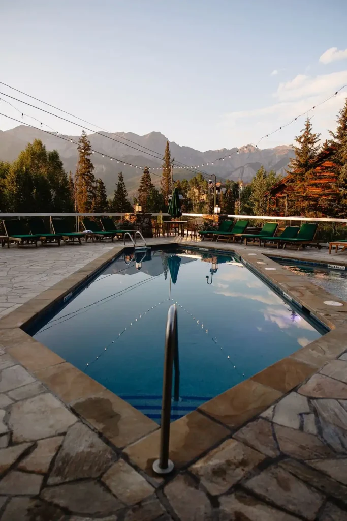 Pool deck reception site at the Telluride Mountain Lodge, a luxury, elegant wedding venue in Telluride, one of the best places to get married in Colorado