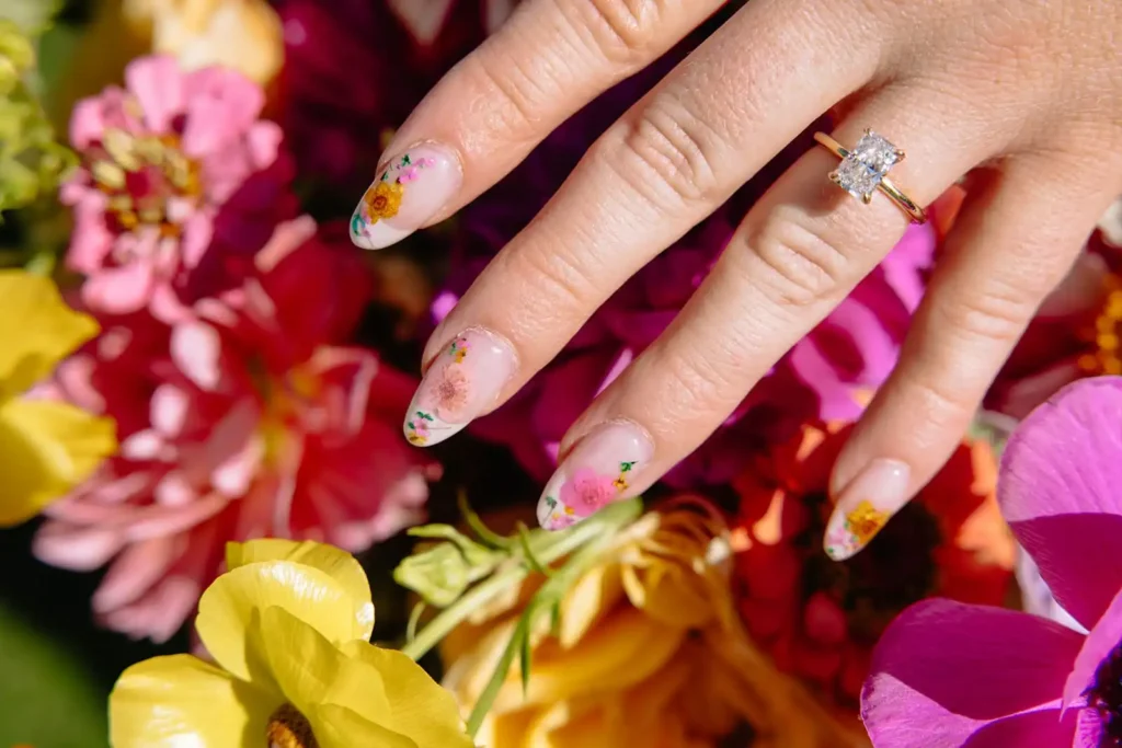 Floral wedding nails - a unique take on a classic wedding manicure. Details like this are important to note on a wedding photography shot list.
