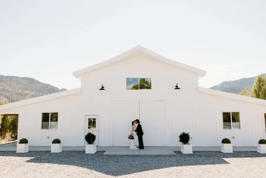 Natural light capturing emotional first glance between bride and groom outside of Vista View Events.
