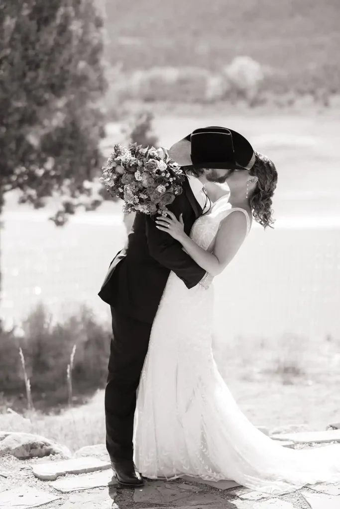Black and white image of quiet, emotional moment during private first look on wedding day.